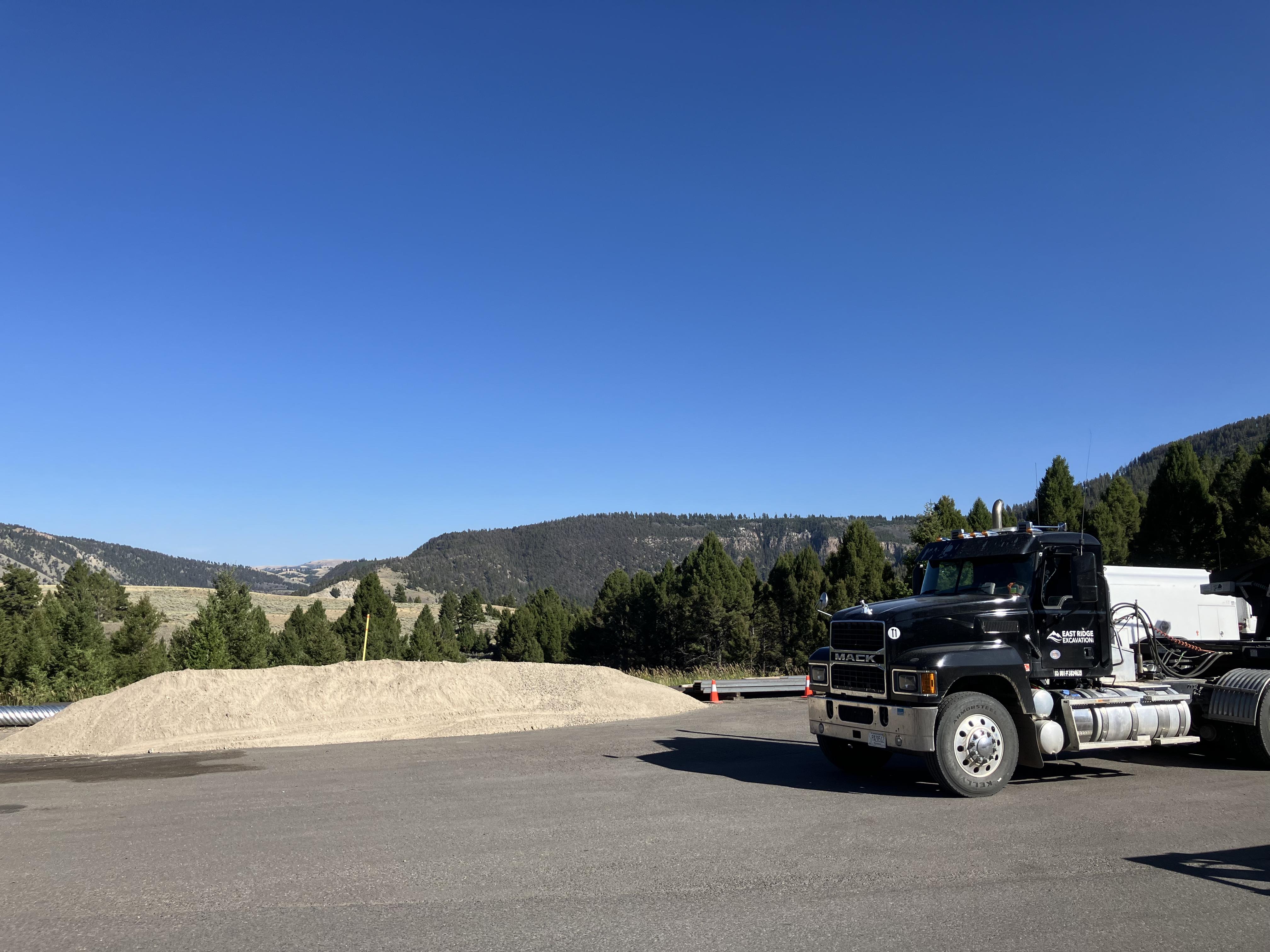 Road mix delivered to the site — Emigrant